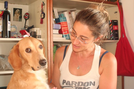 Kefalonia veterinarian Dr. Amanda Micheletti with another street dog, Bimboli, who was horribly injured, ill, malnourished, and emotionally traumatized. She personally rescued and healed him. Now he’s her own beloved boy. Photo: Katerina Lorenzatos Makris