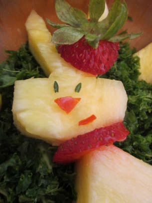 "Thyme leaves for eyes, red bell pepper for nose and mouth, strawberry top for hat, strawberry slice for necklace, and a chickpea tail." Photo: Cadry's Kitchen