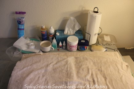Sophia's treatment table, where I spend hours per day cleaning eyes and lesions and applying medications.