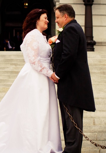 Thayne married fiancé Joe during a big Chain Off demonstration. "The activist in me knew I could draw more women to chain with me for the day if I promised them a wedding at the end of the day," said Thayne. "We women love weddings!"