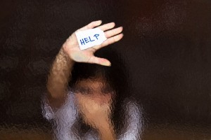diva-memes-diaries-girl-hold-up-hand-and-note-on-glass-says-help-bigstock